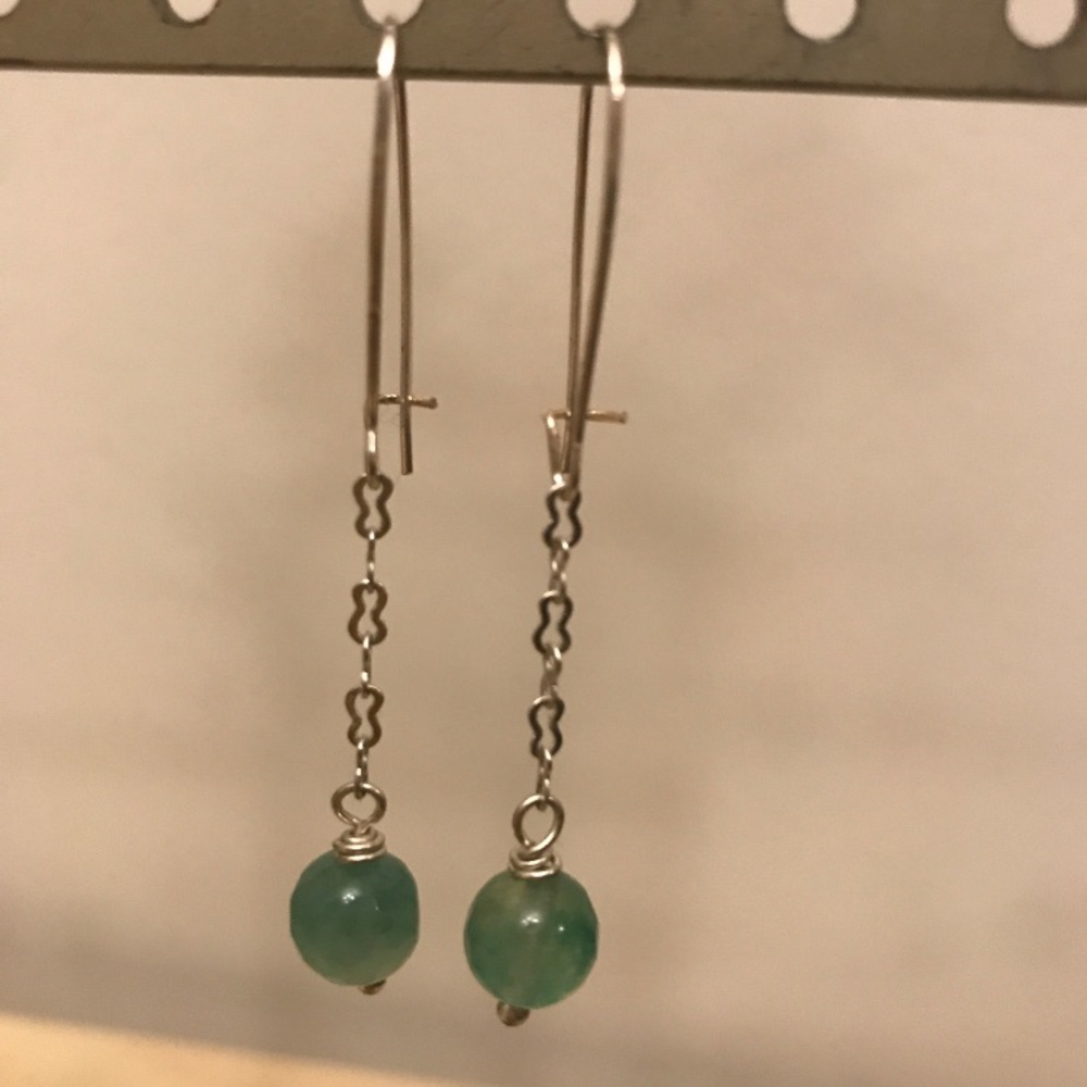 Jade stone earrings on 1 in. silver plated chain.